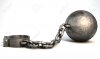 34292484-a-vintage-ball-and-chain-with-an-open-shackle-on-an-isolated-white-studio-background.jpg