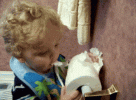 gallery-1476887766-kid-eating-toilet-paper.gif