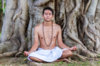 52741486-A-young-Hindu-brahmin-sits-in-meditation-under-a-banyan-tree--Stock-Photo.jpg